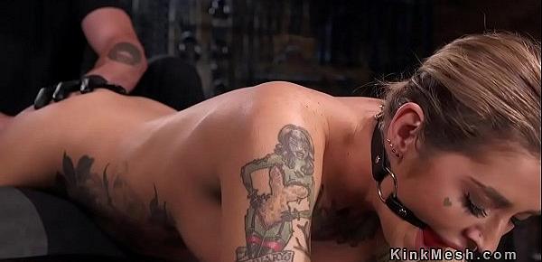  Tattooed blonde in strict device bondage tormented